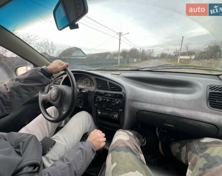 Красный Дэу Ланос, объемом двигателя 1.5 л и пробегом 658 тыс. км за 1500 $, фото 12 на Automoto.ua