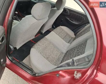 Червоний Деу Ланос, об'ємом двигуна 1.5 л та пробігом 250 тис. км за 1350 $, фото 1 на Automoto.ua