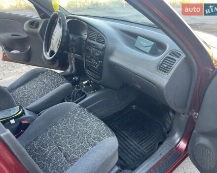 Красный Дэу Ланос, объемом двигателя 1.6 л и пробегом 161 тыс. км за 3300 $, фото 19 на Automoto.ua