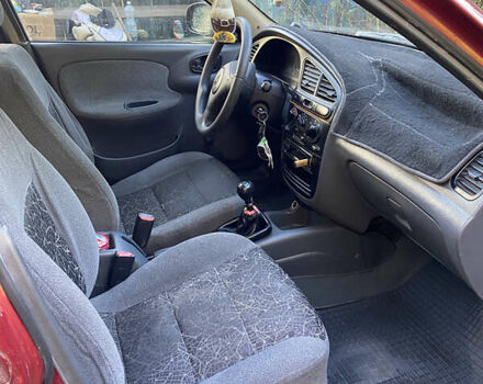 Деу Ланос 2005 у Коломаке на Automoto.ua Червоний Деу Ланос, об'ємом двигуна 1.5 л та пробігом 320 тис. км за 1700 $, фото 4 на Automoto.ua