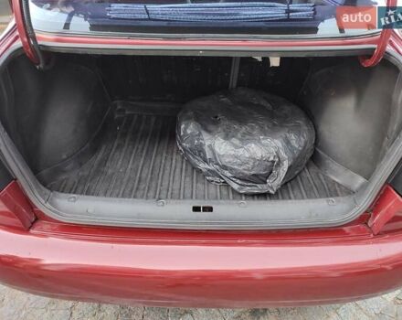 Красный Дэу Ланос, объемом двигателя 1.5 л и пробегом 218 тыс. км за 2900 $, фото 16 на Automoto.ua