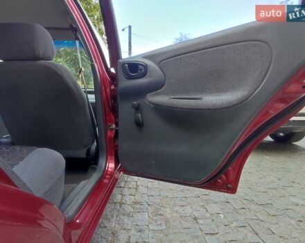 Красный Дэу Ланос, объемом двигателя 1.5 л и пробегом 218 тыс. км за 2900 $, фото 11 на Automoto.ua