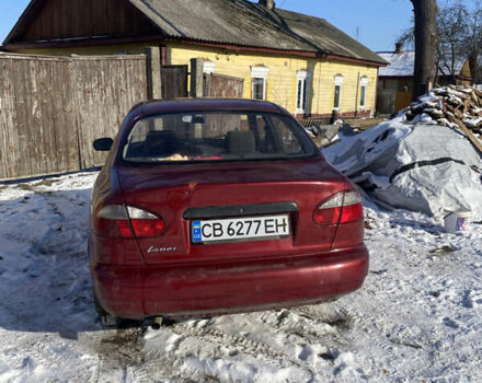 Красный Дэу Ланос, объемом двигателя 1.5 л и пробегом 230 тыс. км за 2100 $, фото 4 на Automoto.ua