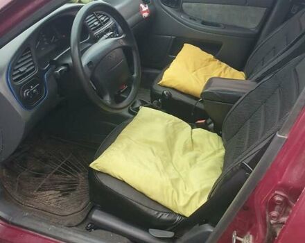 Красный Дэу Ланос, объемом двигателя 1.5 л и пробегом 226 тыс. км за 2400 $, фото 18 на Automoto.ua