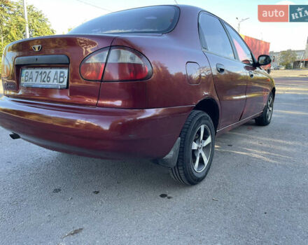 Красный Дэу Ланос, объемом двигателя 1.5 л и пробегом 200 тыс. км за 2150 $, фото 8 на Automoto.ua
