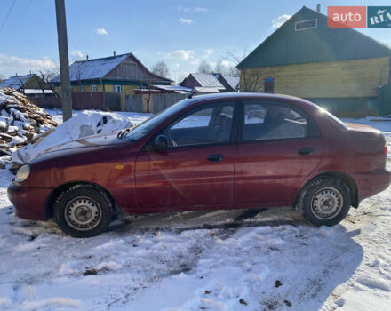 Красный Дэу Ланос, объемом двигателя 1.5 л и пробегом 230 тыс. км за 2100 $, фото 3 на Automoto.ua