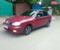 Красный Дэу Ланос, объемом двигателя 1.5 л и пробегом 196 тыс. км за 2300 $, фото 1 на Automoto.ua