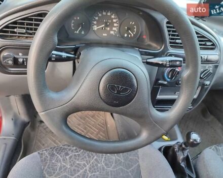 Красный Дэу Ланос, объемом двигателя 1.5 л и пробегом 218 тыс. км за 2900 $, фото 27 на Automoto.ua