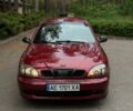 Красный Дэу Ланос, объемом двигателя 1.5 л и пробегом 278 тыс. км за 2400 $, фото 1 на Automoto.ua