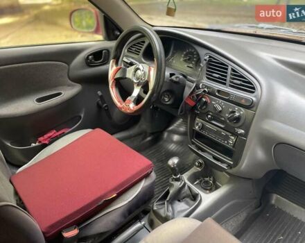 Червоний Деу Ланос, об'ємом двигуна 1.3 л та пробігом 128 тис. км за 1800 $, фото 3 на Automoto.ua