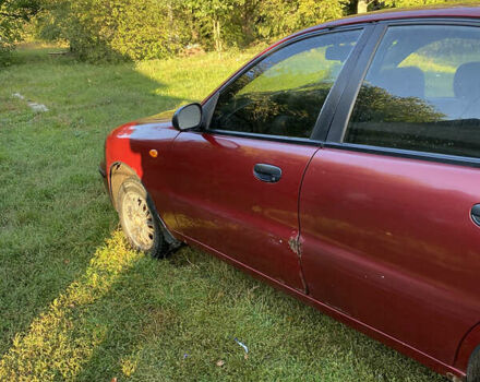 Деу Ланос 2005 у Коломаке на Automoto.ua Червоний Деу Ланос, об'ємом двигуна 1.5 л та пробігом 320 тис. км за 1700 $, фото 9 на Automoto.ua