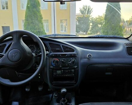 Красный Дэу Ланос, объемом двигателя 1.5 л и пробегом 165 тыс. км за 2100 $, фото 8 на Automoto.ua