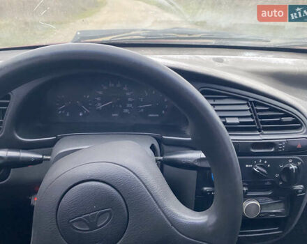 Красный Дэу Ланос, объемом двигателя 1.5 л и пробегом 220 тыс. км за 1350 $, фото 5 на Automoto.ua