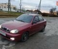 Красный Дэу Ланос, объемом двигателя 1.5 л и пробегом 245 тыс. км за 1650 $, фото 1 на Automoto.ua
