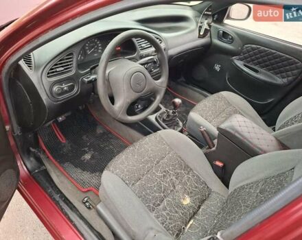 Червоний Деу Ланос, об'ємом двигуна 1.5 л та пробігом 250 тис. км за 1350 $, фото 3 на Automoto.ua