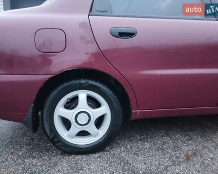 Красный Дэу Ланос, объемом двигателя 1.6 л и пробегом 244 тыс. км за 2850 $, фото 3 на Automoto.ua