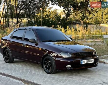 Красный Дэу Ланос, объемом двигателя 1.5 л и пробегом 150 тыс. км за 3300 $, фото 3 на Automoto.ua