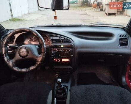 Червоний Деу Ланос, об'ємом двигуна 1.5 л та пробігом 230 тис. км за 1800 $, фото 11 на Automoto.ua