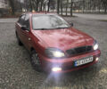 Красный Дэу Ланос, объемом двигателя 1.6 л и пробегом 252 тыс. км за 2450 $, фото 1 на Automoto.ua