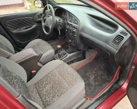 Червоний Деу Ланос, об'ємом двигуна 1.5 л та пробігом 250 тис. км за 1350 $, фото 5 на Automoto.ua
