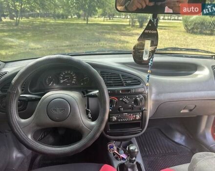 Красный Дэу Ланос, объемом двигателя 1.5 л и пробегом 59 тыс. км за 3750 $, фото 5 на Automoto.ua