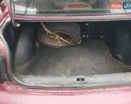 Красный Дэу Ланос, объемом двигателя 1.5 л и пробегом 226 тыс. км за 2400 $, фото 7 на Automoto.ua