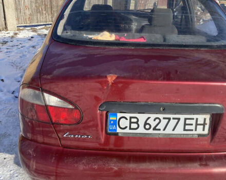Красный Дэу Ланос, объемом двигателя 1.5 л и пробегом 230 тыс. км за 2100 $, фото 5 на Automoto.ua