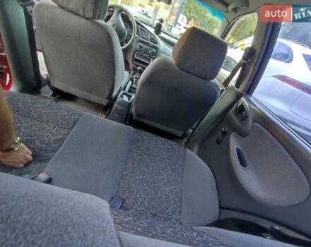 Красный Дэу Ланос, объемом двигателя 1.5 л и пробегом 218 тыс. км за 2900 $, фото 28 на Automoto.ua