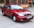 Красный Дэу Ланос, объемом двигателя 1.5 л и пробегом 102 тыс. км за 2500 $, фото 1 на Automoto.ua