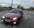 Красный Дэу Ланос, объемом двигателя 1.5 л и пробегом 245 тыс. км за 1650 $, фото 1 на Automoto.ua