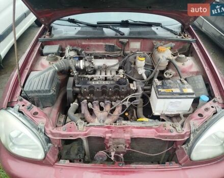 Красный Дэу Ланос, объемом двигателя 1.5 л и пробегом 245 тыс. км за 1100 $, фото 5 на Automoto.ua