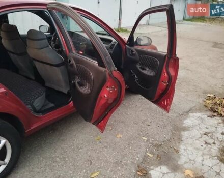 Червоний Деу Ланос, об'ємом двигуна 1.5 л та пробігом 230 тис. км за 1800 $, фото 9 на Automoto.ua