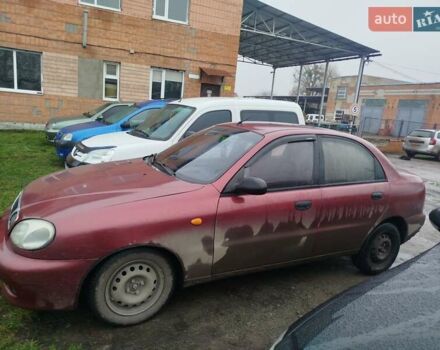 Красный Дэу Ланос, объемом двигателя 1.5 л и пробегом 245 тыс. км за 1100 $, фото 1 на Automoto.ua
