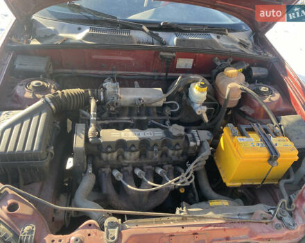 Красный Дэу Ланос, объемом двигателя 1.5 л и пробегом 230 тыс. км за 2100 $, фото 9 на Automoto.ua