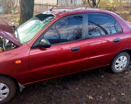 Красный Дэу Ланос, объемом двигателя 1.4 л и пробегом 180 тыс. км за 2400 $, фото 7 на Automoto.ua