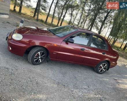 Красный Дэу Ланос, объемом двигателя 1.6 л и пробегом 161 тыс. км за 3300 $, фото 7 на Automoto.ua