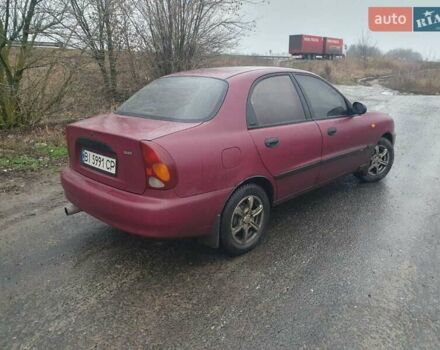 Красный Дэу Ланос, объемом двигателя 1.5 л и пробегом 226 тыс. км за 2400 $, фото 4 на Automoto.ua