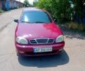 Красный Дэу Ланос, объемом двигателя 1.5 л и пробегом 195 тыс. км за 2800 $, фото 1 на Automoto.ua