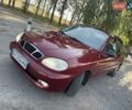 Красный Дэу Ланос, объемом двигателя 1.6 л и пробегом 161 тыс. км за 3300 $, фото 5 на Automoto.ua