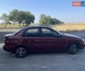 Красный Дэу Ланос, объемом двигателя 1.6 л и пробегом 161 тыс. км за 3300 $, фото 9 на Automoto.ua