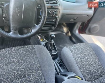 Красный Дэу Ланос, объемом двигателя 1.6 л и пробегом 161 тыс. км за 3300 $, фото 13 на Automoto.ua