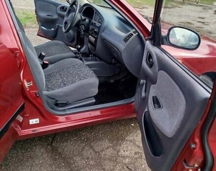 Красный Дэу Ланос, объемом двигателя 1.5 л и пробегом 216 тыс. км за 2500 $, фото 16 на Automoto.ua