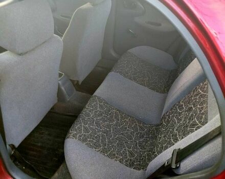 Красный Дэу Ланос, объемом двигателя 1.4 л и пробегом 180 тыс. км за 2400 $, фото 2 на Automoto.ua