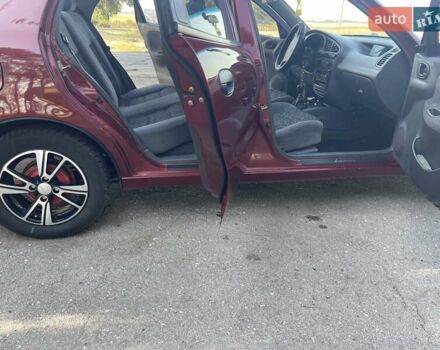 Красный Дэу Ланос, объемом двигателя 1.6 л и пробегом 161 тыс. км за 3300 $, фото 15 на Automoto.ua