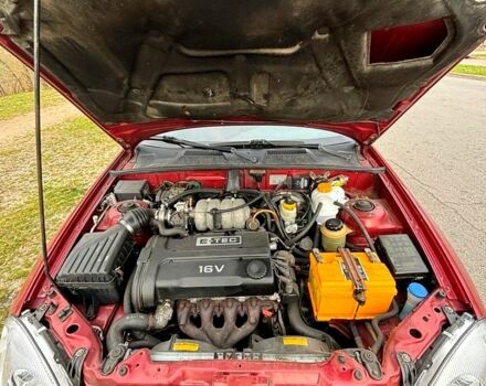 Красный Дэу Ланос, объемом двигателя 1.6 л и пробегом 275 тыс. км за 2390 $, фото 3 на Automoto.ua