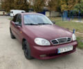 Красный Дэу Ланос, объемом двигателя 1.6 л и пробегом 210 тыс. км за 2000 $, фото 1 на Automoto.ua