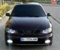 Красный Дэу Ланос, объемом двигателя 1.5 л и пробегом 150 тыс. км за 3300 $, фото 1 на Automoto.ua