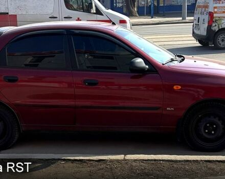 Красный Дэу Ланос, объемом двигателя 1.6 л и пробегом 275 тыс. км за 2390 $, фото 1 на Automoto.ua