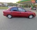 Красный Дэу Ланос, объемом двигателя 1.5 л и пробегом 218 тыс. км за 2900 $, фото 4 на Automoto.ua