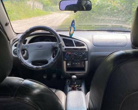 Красный Дэу Ланос, объемом двигателя 1.6 л и пробегом 222 тыс. км за 2660 $, фото 9 на Automoto.ua